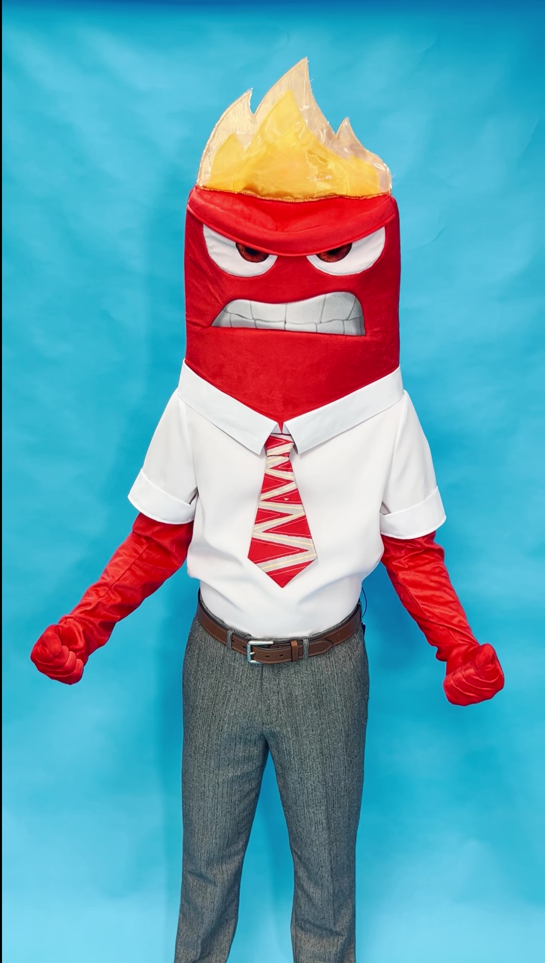 Every crew needs a realist and Disney & Pixar's Inside Out is included! Anger might be quick-tempered but he's also comedic fire! We dissolve into giggles whenever his hair becomes a blow torch or his frustration plays as sarcasm. If you feel the same, it's time to celebrate that fiery style with this Disney Pixar Anger Costume!