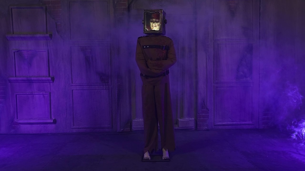 Unleash pure terror with the 6FT Boxhead Torture Demon Animated Decoration. With twisted movements, glowing red eyes, and spine-chilling sound effects, this nightmare-fueled creature is built to haunt your darkest Halloween dreams.