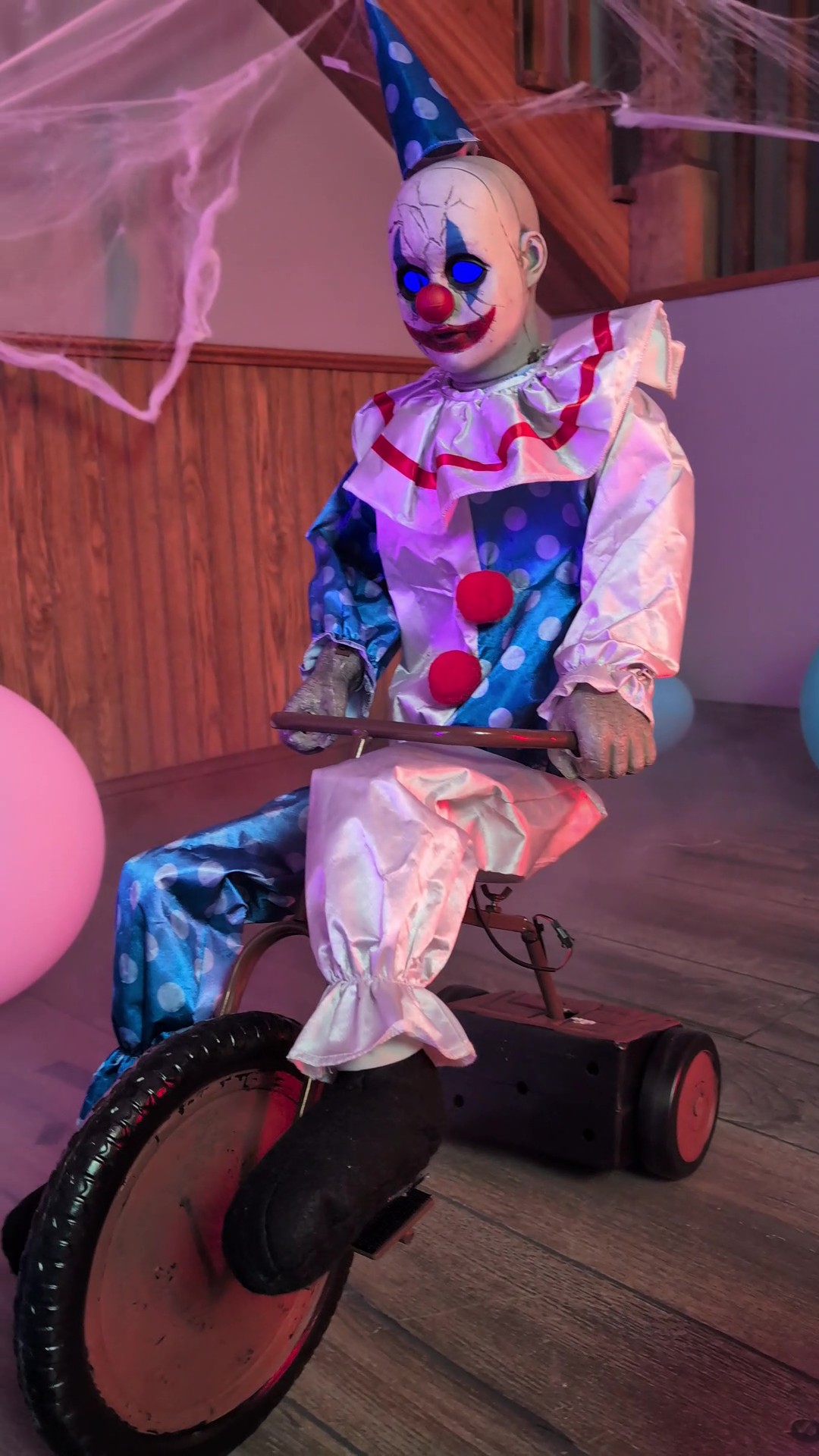 Bring classic horror to life with the Tricycle Doll Animatronic Decoration, a spooky addition to your Halloween décor or haunted room theme.