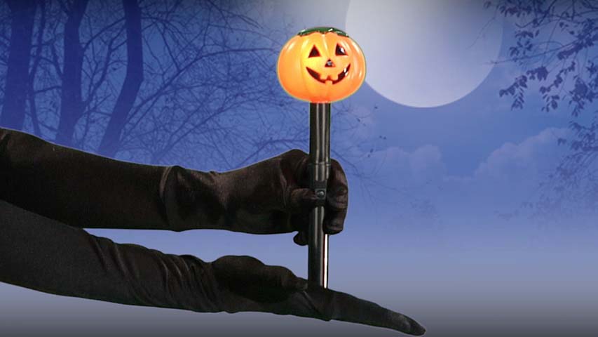 This Pumpkin flashlight is a great accessory for having a safe Halloween.  The jack o' lantern top glows and runs on 2 AA batteries.